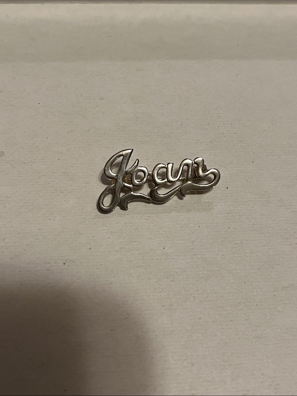 Silver tone ‘Joan’ pin